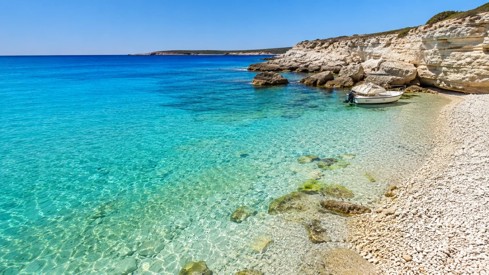 Crystal-clear turquoise waters of Cala Rossa, Favignana